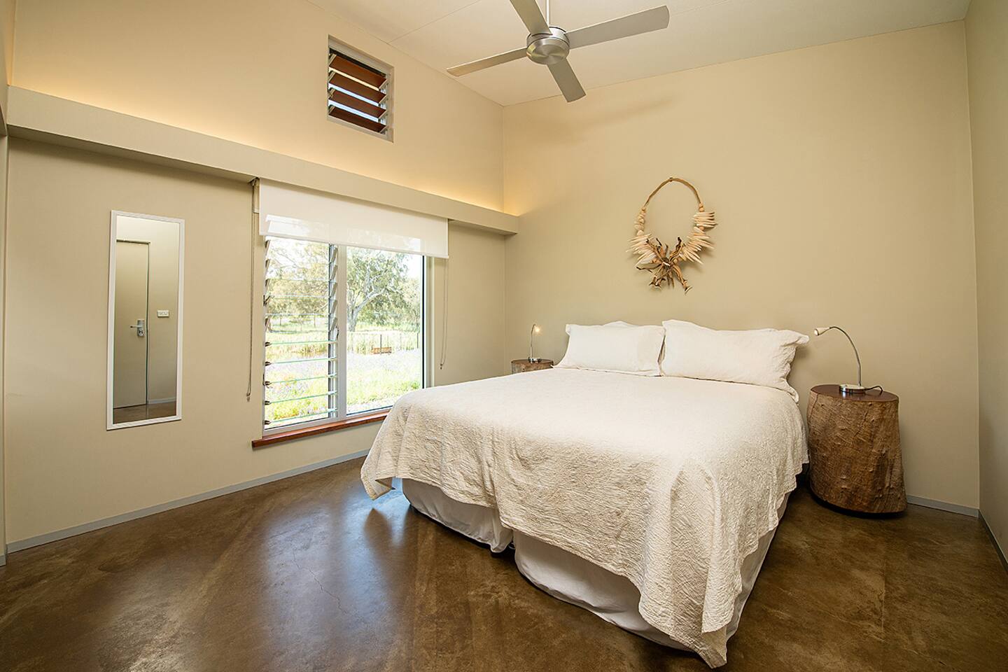 This image shows the bedroom set up with a king bed