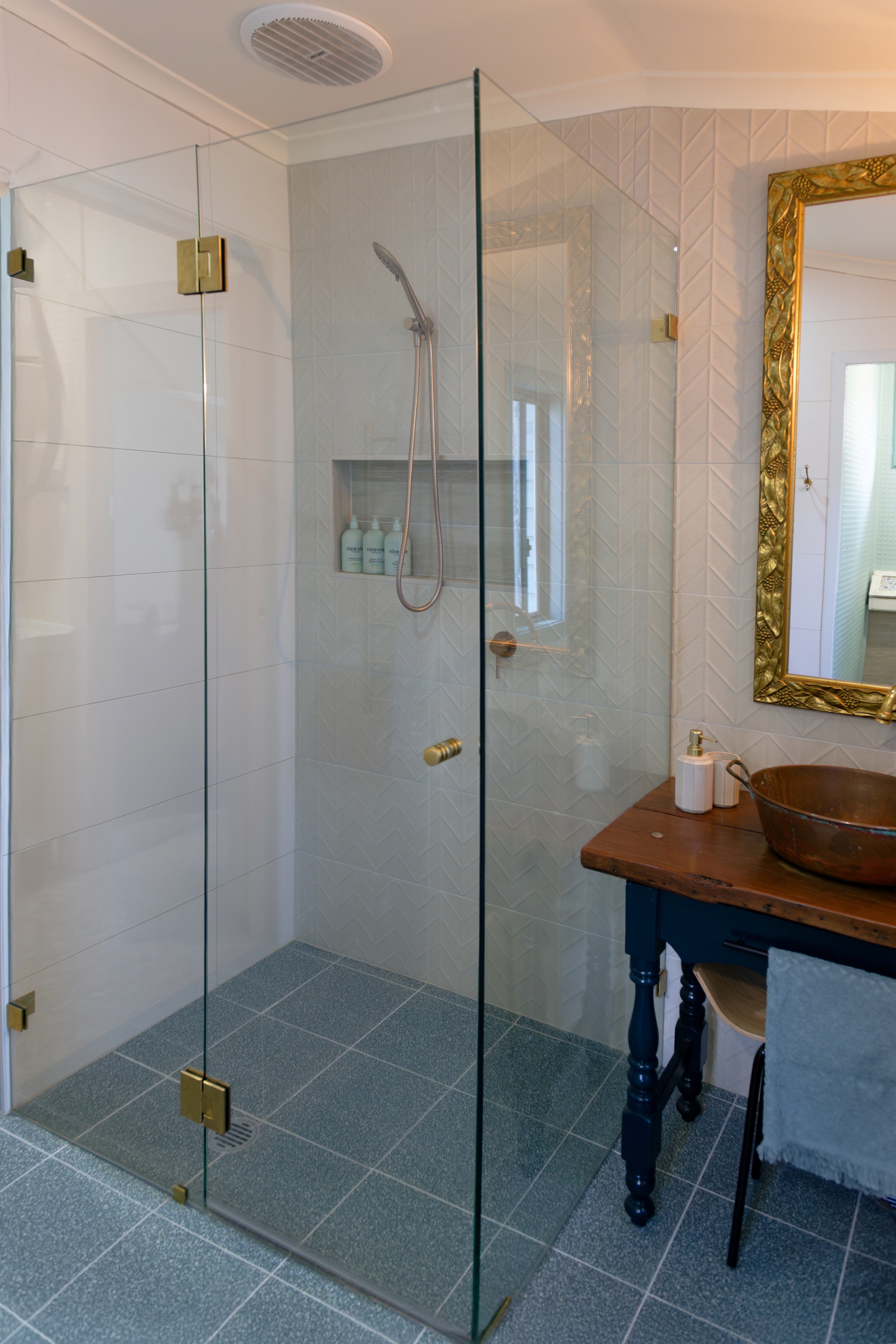 level entry to bathroom and to shower